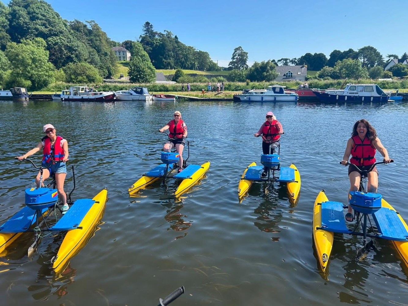 a group of people on a raft in the water