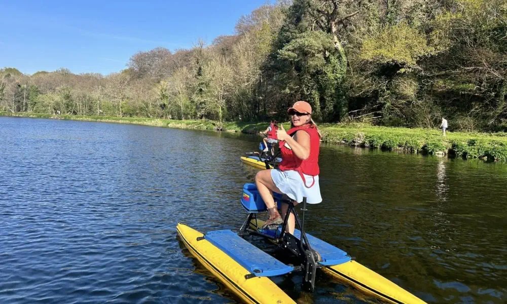 Woman enjoying hydrobike water actyivity on the River Barrow near Graiguenamanagh