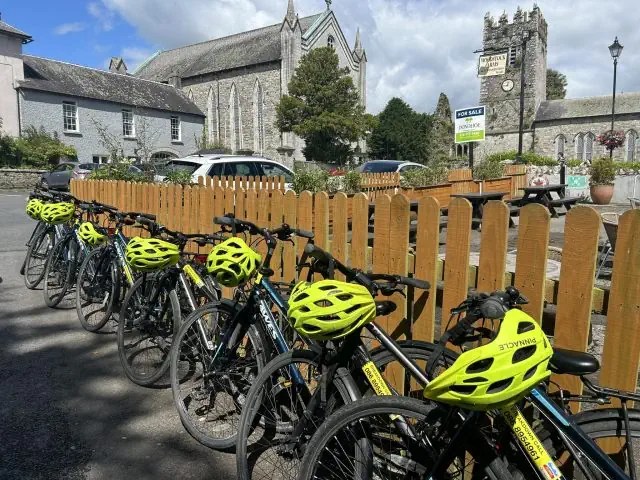 Bicycles parked in front of Kilkenny's historical sights